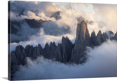 The Cadini Di Misurina Emerging From The Sea Of Clouds, Sunset, Dolomites, Italy