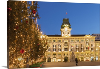 The city hall in Unita d'Italia square in Trieste in Christmas time at dusk, Italy