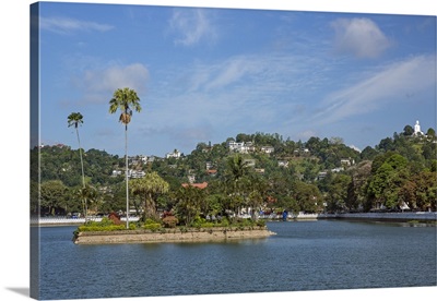 The city of Kandy is built around its picturesque artificial lake and the hills beyond