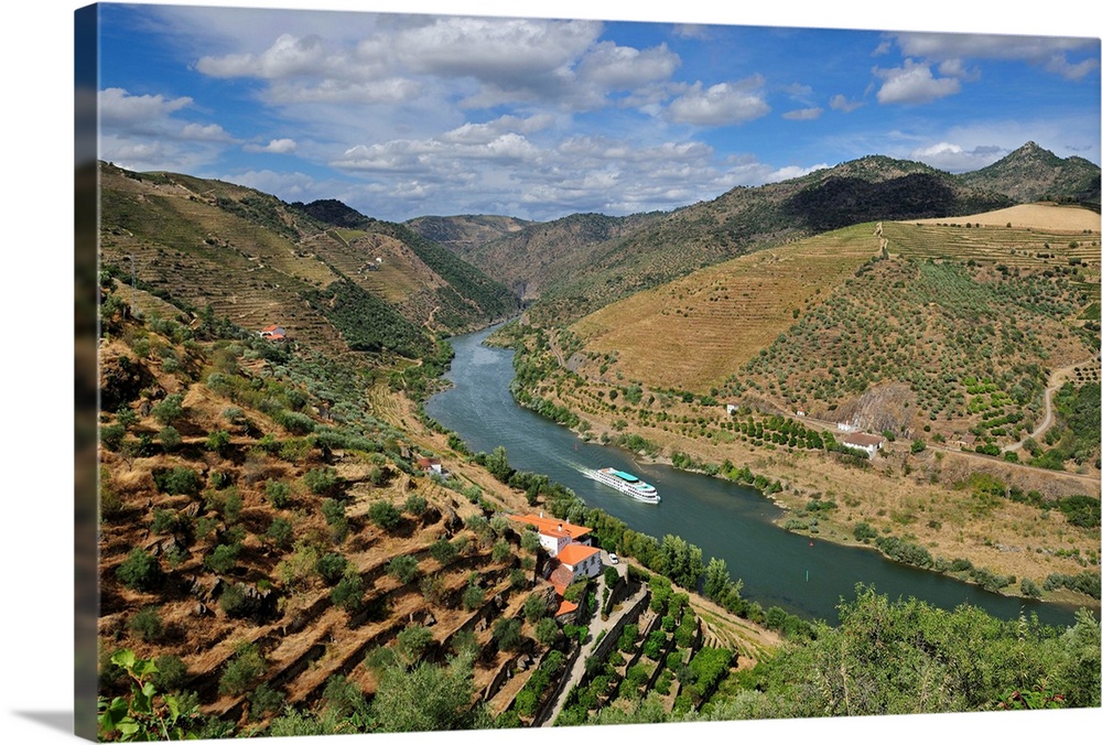 The Douro river and a hotel-ship in the Valeira Dam. Sao Joao da Pesqueira, Portugal