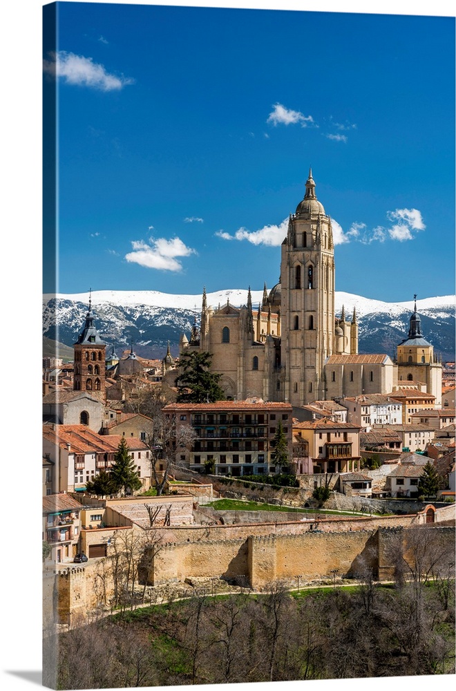 City Skyline With The Gothic Cathedral And The Snowy Mountains Of Sierra De Guadarrama In The Background, Segovia, Castile...