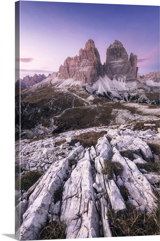 The iconic Tre Cime di Lavaredo during a clear autumn sunset. Dolomites, Italy.