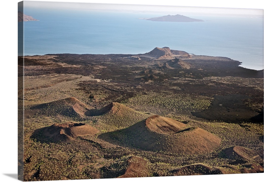 The lava barrier that separates the southern end of Lake Turkana from the Suguta Valley. South Island is in the distance w...