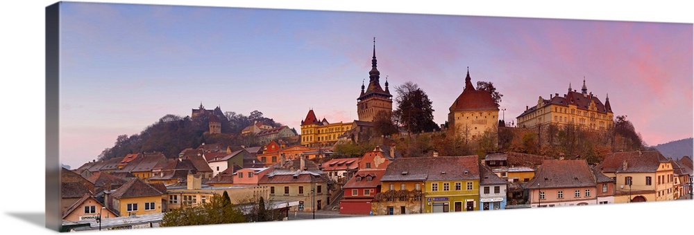 The Medieval Old Town of Sighisoara illuminated at sunrise, Sighisoara, Transylvania, Romania