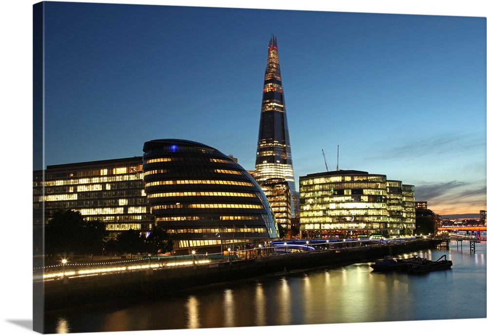 The Shard is the tallest building in Western Europe and was completed in 2012. On the left is the City Hall from Norman Fo...