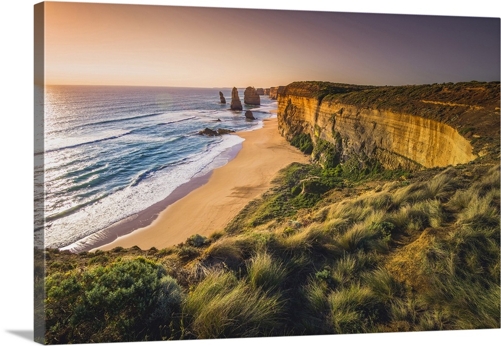 The Twelve Apostles, Port Campbell National Park, Victoria, Australia. The Limestone stacks and the coast at sunset.