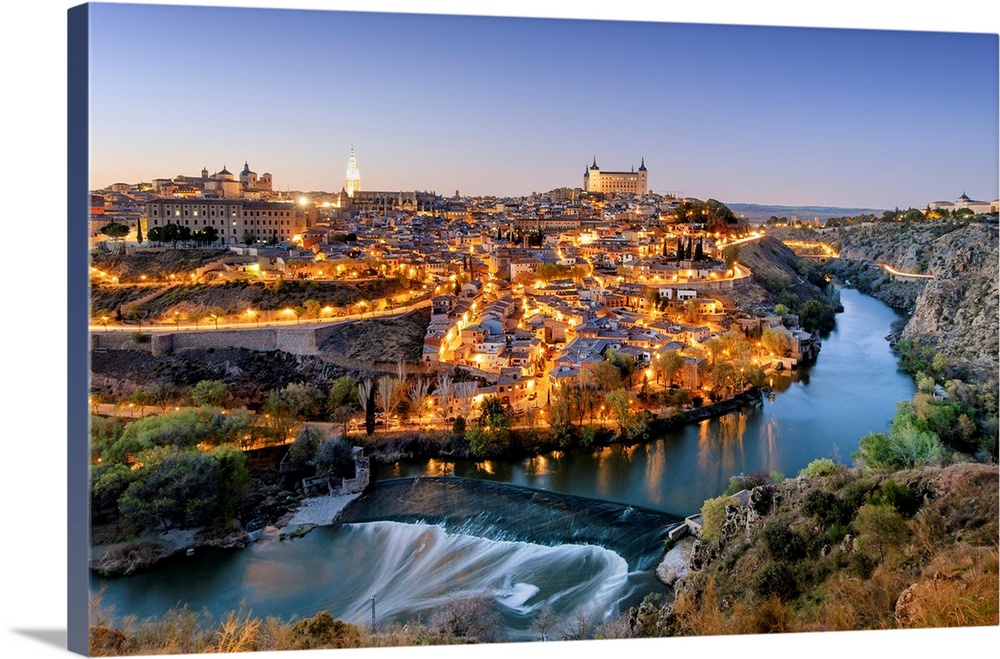 Toledo and the Tagus river at twilight, a UNESCO World Heritage Site. Castilla la Mancha, Spain.