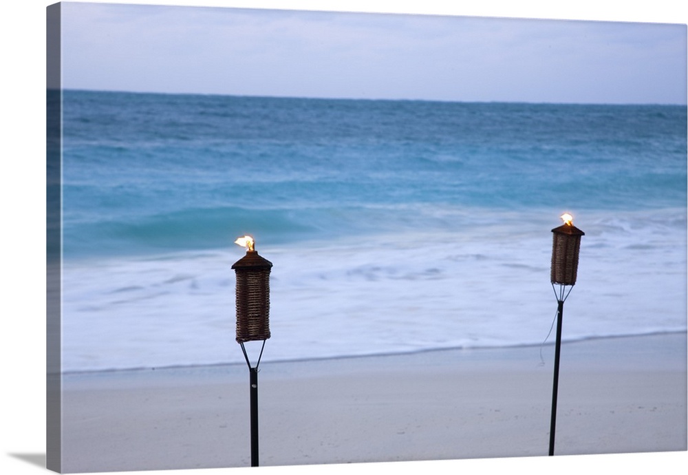 Torches on beach.Grace Bay.Providenciales.Turks and Caicos