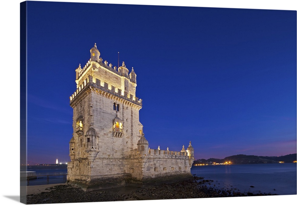 The early 16th century Portuguese Manueline Style, Torre de Belem designed by the architect Francisco de Arruda at twiligh...