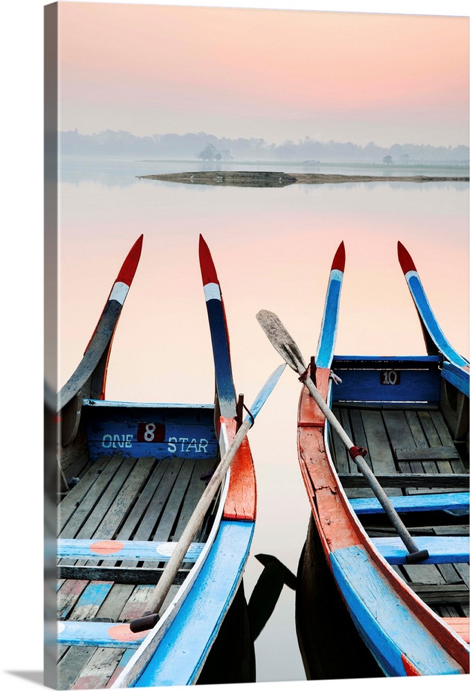 Traditional Burmese boats at sunrise on Taungthaman Lake, Amarapura, Mandalay, Burma (Myanmar)