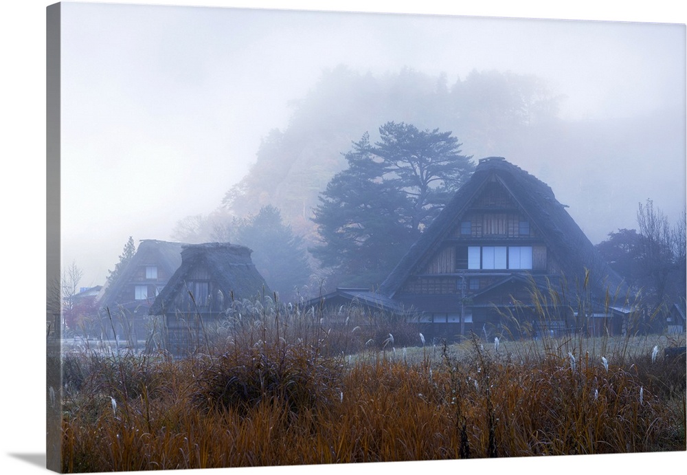 Traditional houses of Ogimachi (UNESCO World Heritage Site) in mist, Shirakawa-go, Toyama Prefecture, Japan