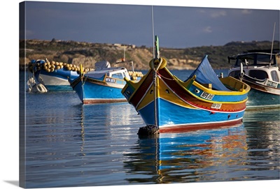 Traditional Maltese boats known locally as 'luzzu' in the village of Marsaxlokk