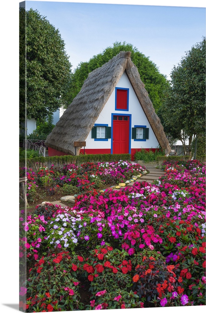 Traditional thatch house with flowers, Santana, Madeira, Portugal