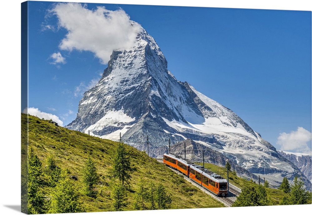 Train along the Gornergrat mountain rack railway with Matterhorn in the foreground, Zermatt, Valais, Switzerland
