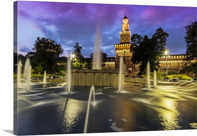 Twilight view of Sforza Castle and fountain, Milan, Lombardy, Italy