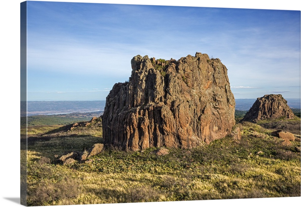 Kenya, Aberdares, Aberdare National Park, Nyandarua County. Two large rock outcrops, known as Twin Peaks, dominate the moo...