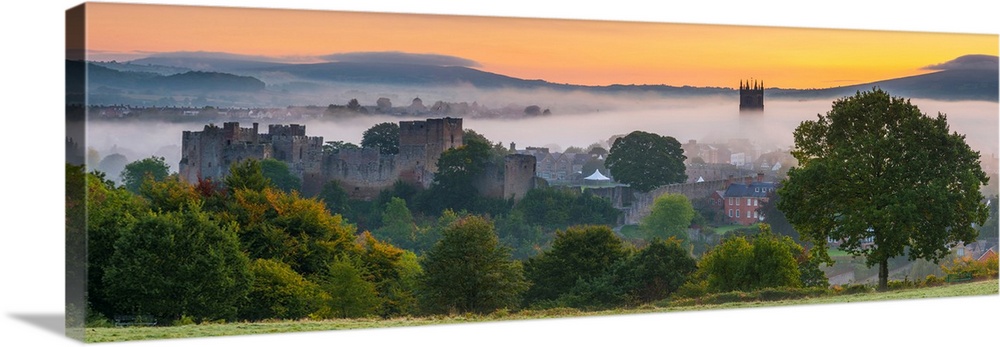 UK, England, Shropshire, Ludlow, Ludlow Castle And St Laurence's Church At Sunrise