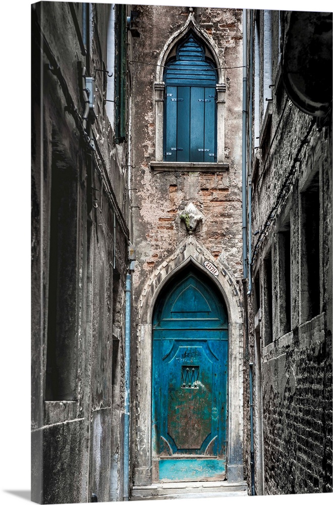 Venice, Veneto, Italy. Blue Moorish Door In A Narrow Street.