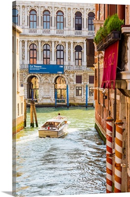 Venice, Veneto, Italy. Buildings and boats in the canals. Ca' Pesaro Palace