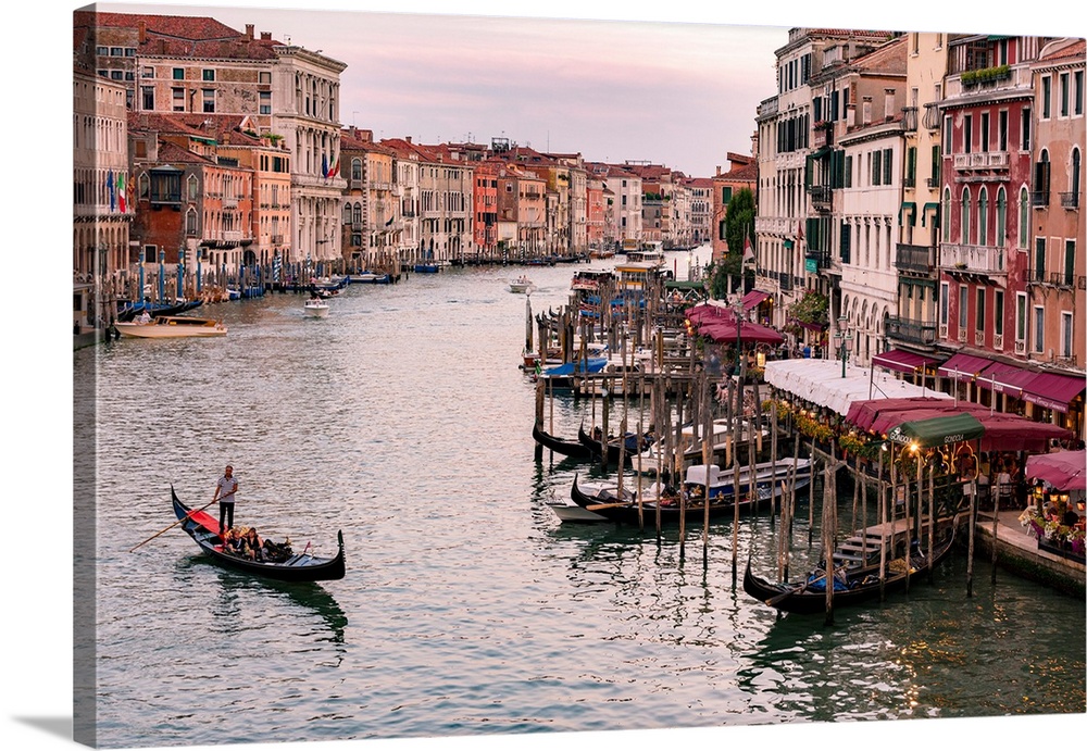 Venice, Veneto, Italy. Buildings and gondola from Rialto Bridge.