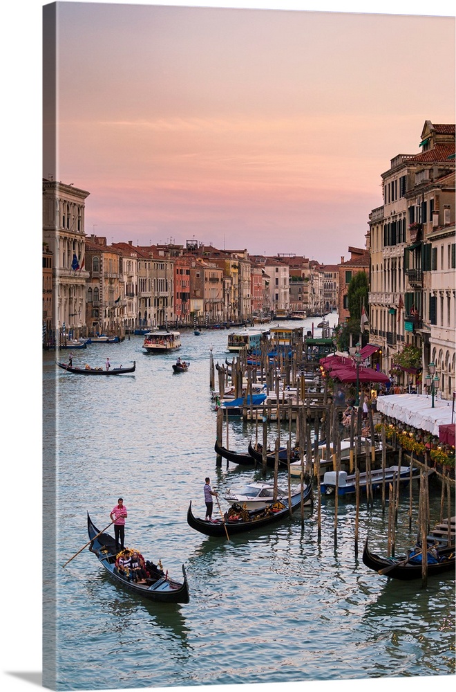 Venice, Veneto, Italy. Buildings and gondola from Rialto Bridge.
