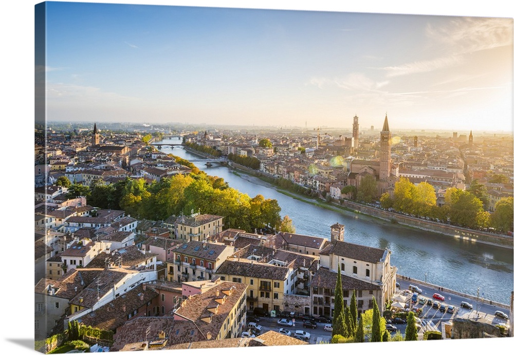 Verona, Veneto, Italy. High angle view of the old town and the Adige river at sunset.
