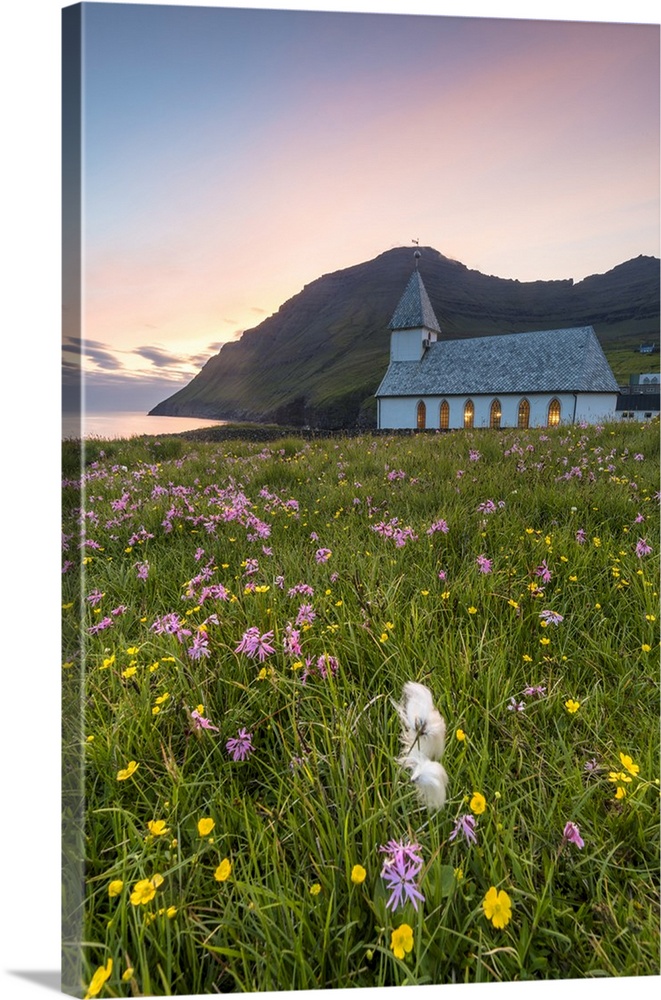 Vidareidi village, Vidoy island, Faroe Islands, Denmark. Village's church at sunset.
