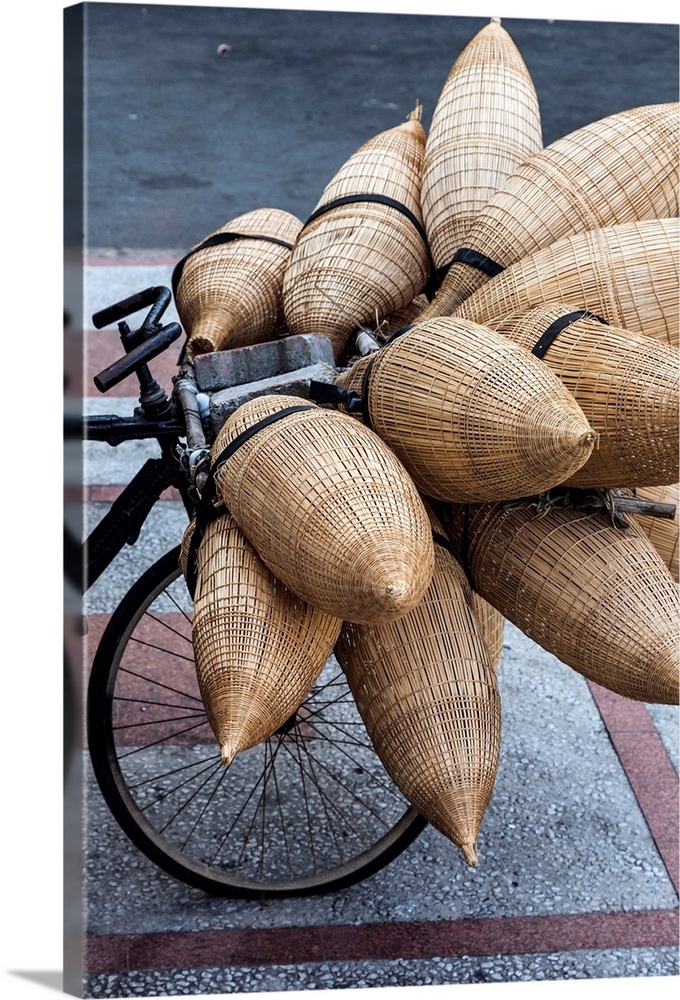 Vietnam, Ho Chi Minh City, bicycle with wicker baskets.