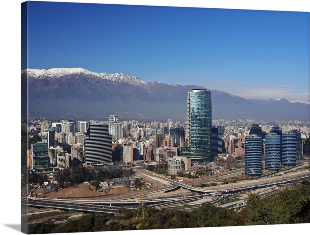 Chile, Santiago, View from the Parque Metropolitano towards the high raised buildings in financial sector. Snow covered An...