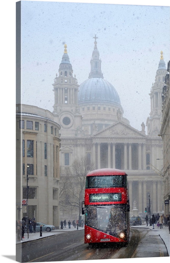 United Kingdom, England, London, View Of A Red London Bus In Front Of St Paul's Cathedral In The Snow