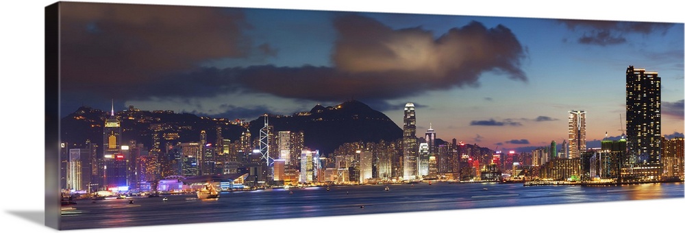 View of Hong Kong Island and Tsim Sha Tsui skylines at sunset, Hong Kong