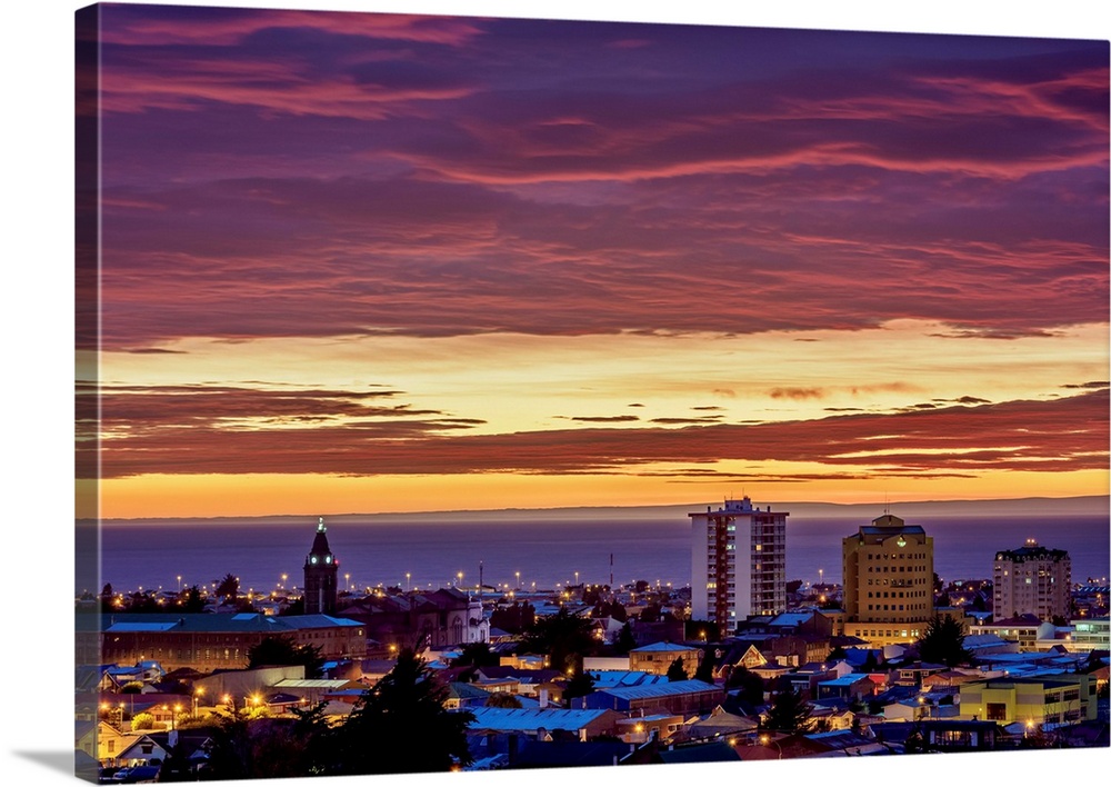 View over city towards Strait of Magellan at sunrise, Punta Arenas, Magallanes Province, Patagonia, Chile.