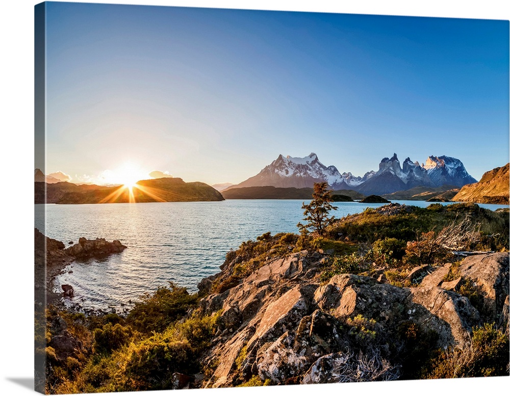 View over Lake Pehoe towards Paine Grande and Cuernos del Paine, sunset, Torres del Paine National Park, Patagonia, Chile.