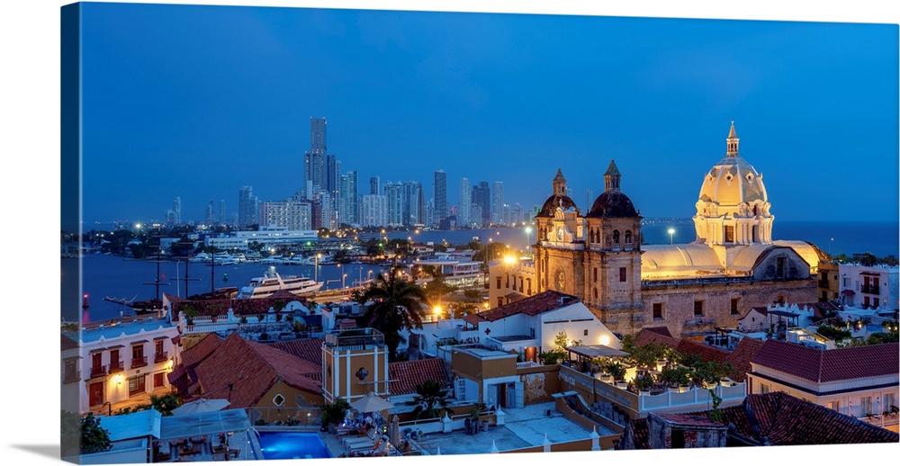 View over Old Town towards San Pedro Claver Church and Bocagrande at dusk, Cartagena, Bolivar Department, Colombia.