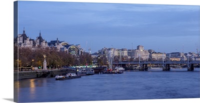 View over River Thames towards Hungerford Bridge and Charing Cross Station, London