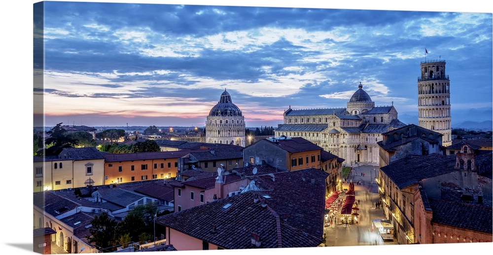 View over Via Santa Maria towards Cathedral and Leaning Tower at dusk, Pisa, Tuscany, Italy.
