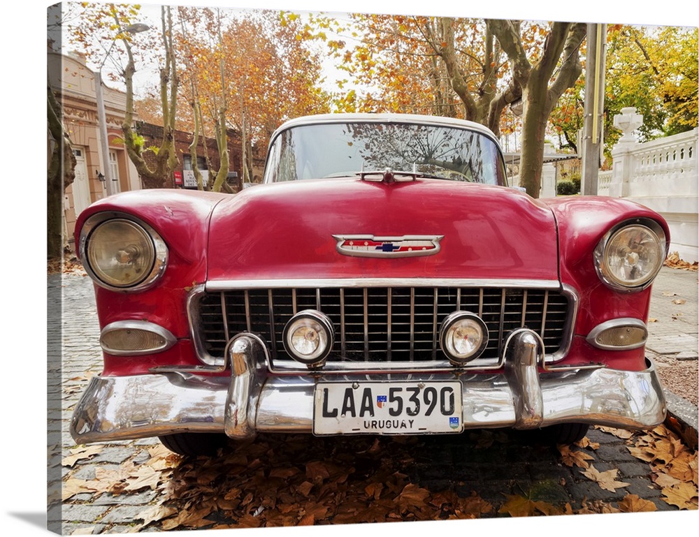 Uruguay, Colonia Department, Colonia del Sacramento, Vintage car on the cobblestone lane of the historic quarter.