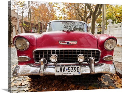 Vintage car on the cobblestone lane of the historic quarter, Uruguay
