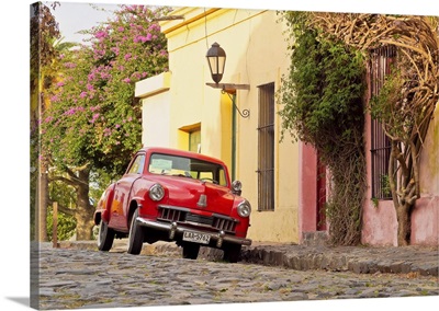 Vintage Studebaker car on the cobblestone lane of the historic quarter, Uruguay