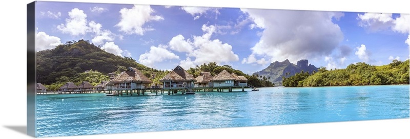 Water bungalows of Hilton resort in the lagoon of Bora Bora, French ...