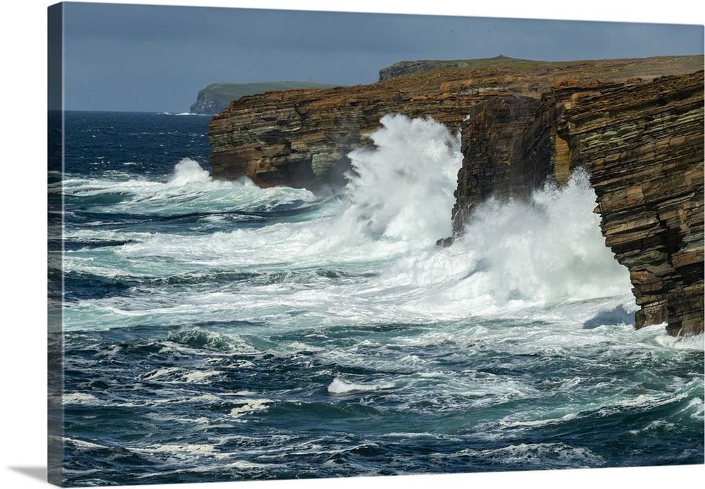 Huge waves crash against the layered cliffs of Yesnaby on the wild west coast of Mainland, Orkney Islands, Scotland. Autum...