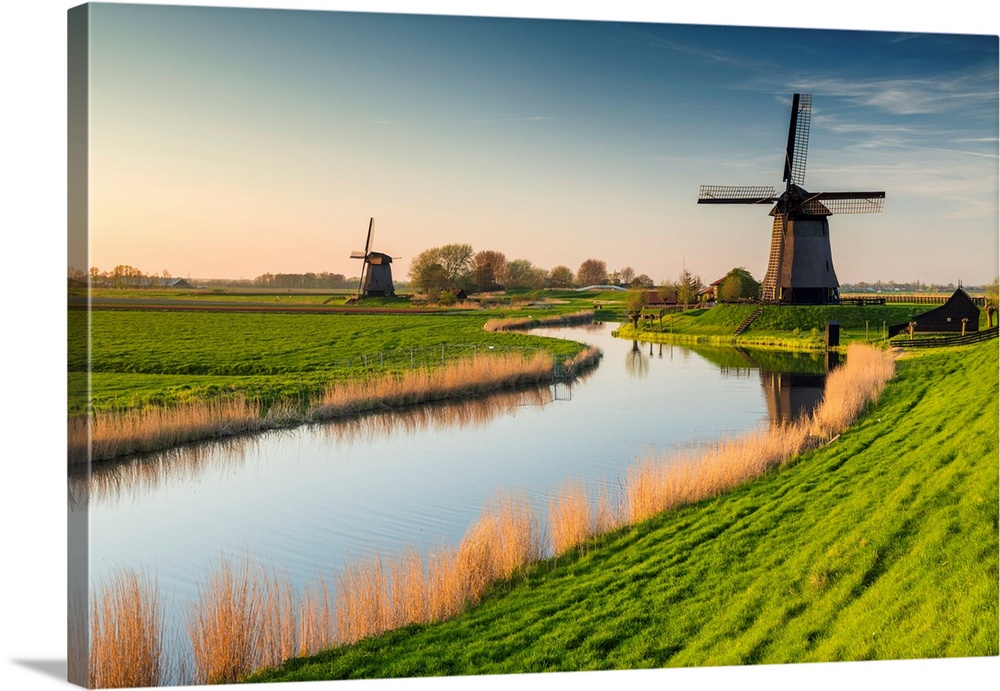 Windmill Along Canal, near Schermerhorn, North Holland, Netherlands.