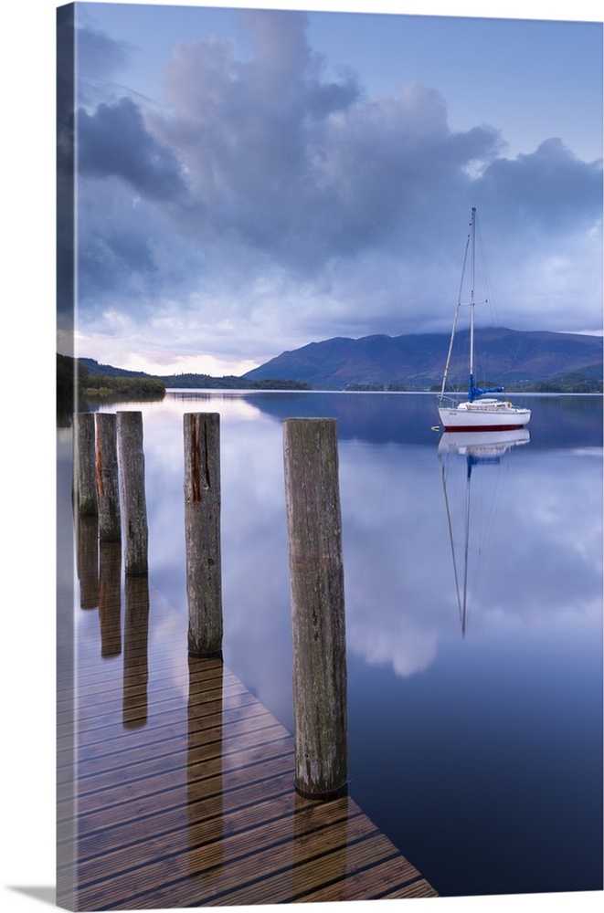 Yacht moored near Lodore boat launch on Derwent Water, Lake District, Cumbria, England. Autumn (September)