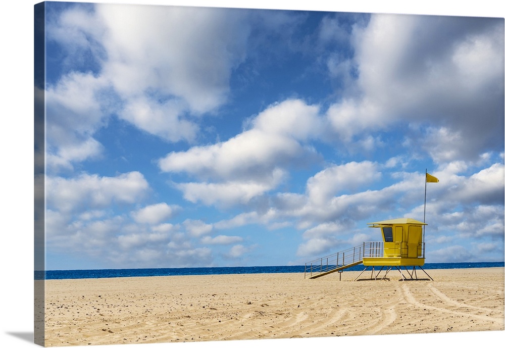 Yellow lifeguard's cabin on empty sand beach, Morro Jable, Fuerteventura, Canary Islands, Spain.