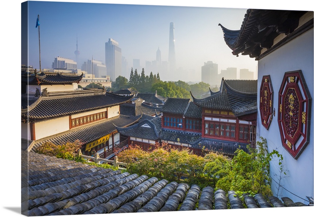 Yu Yuan Gardens and Pudong skyline behind, Shanghai, China.