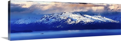 A Panoramic of A Lone Fishing Boat Pulling Into Homer Bay at Sunrise