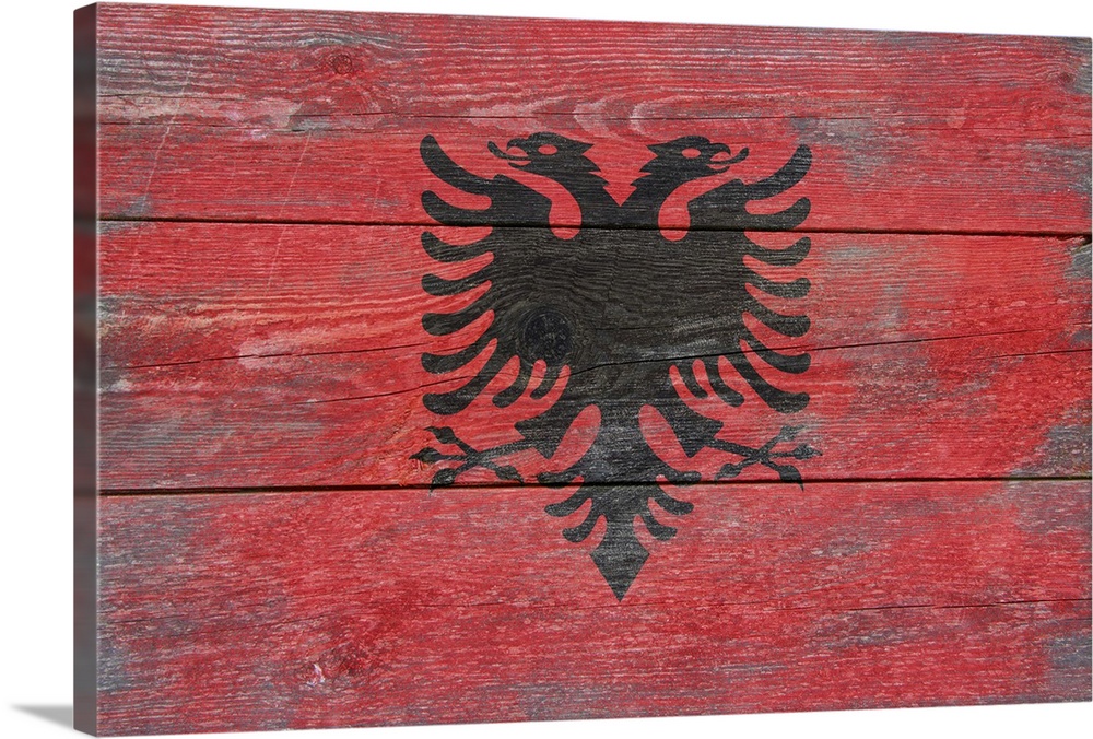 The flag of Albania with a weathered wooden board effect.