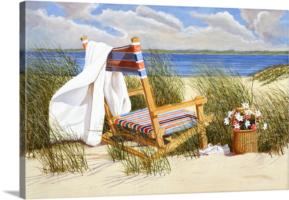 Basket of white and red flowers and white shoes next to a striped beach chair with a towel in sandy beach and grass with w...