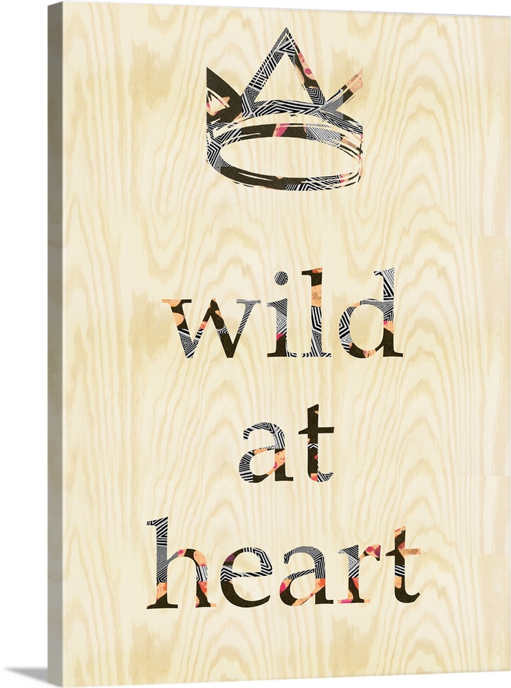 "Wild at heart" with a crown design on woodgrain.