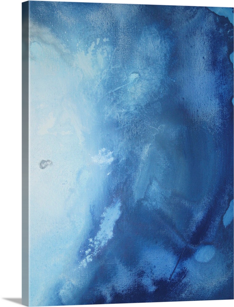 Vibrant tones of blue blend in a fluid dance of color with gray and white to create a stunning abstract image.